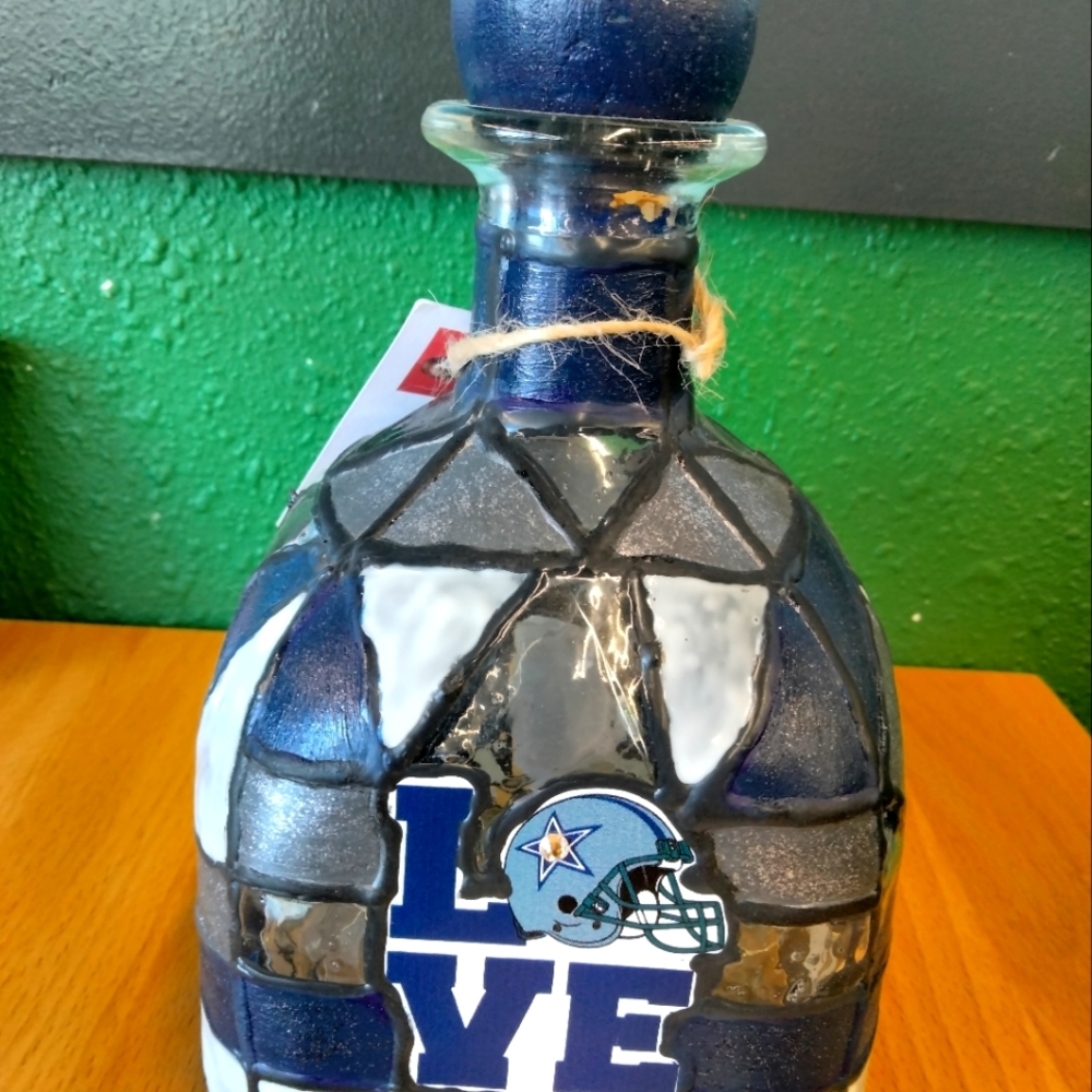 Faux leaf painted Dallas Cowboys bottle